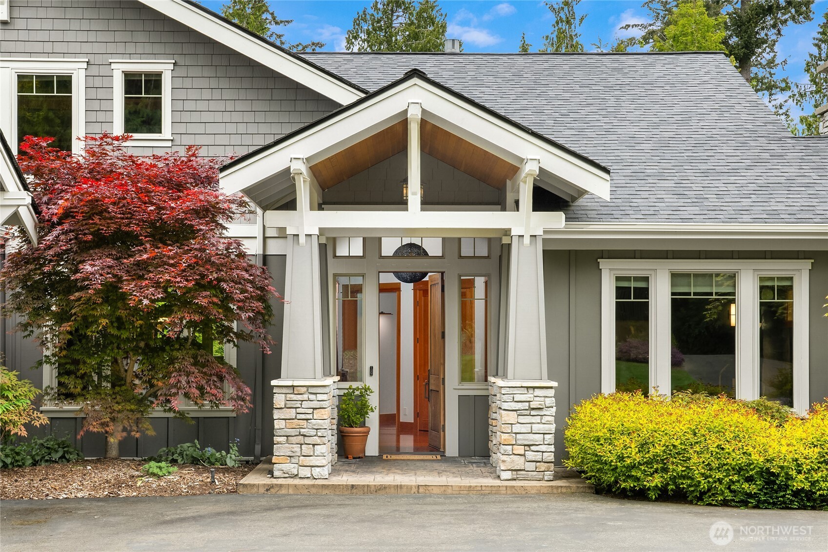 6477 Haley Loop Road Northeast Bainbridge Island, WA 98110 - Photo 3 of 40 a view of a house with outdoor space