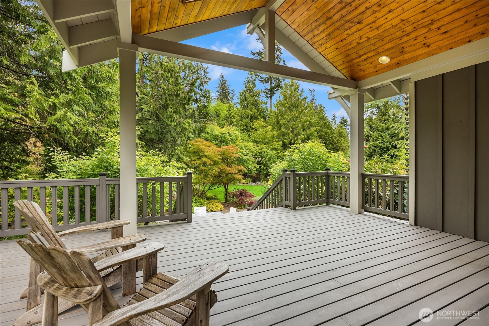 6477 Haley Loop Road Northeast Bainbridge Island, WA 98110 - Photo 37 of 40 a view of a two chairs in the balcony