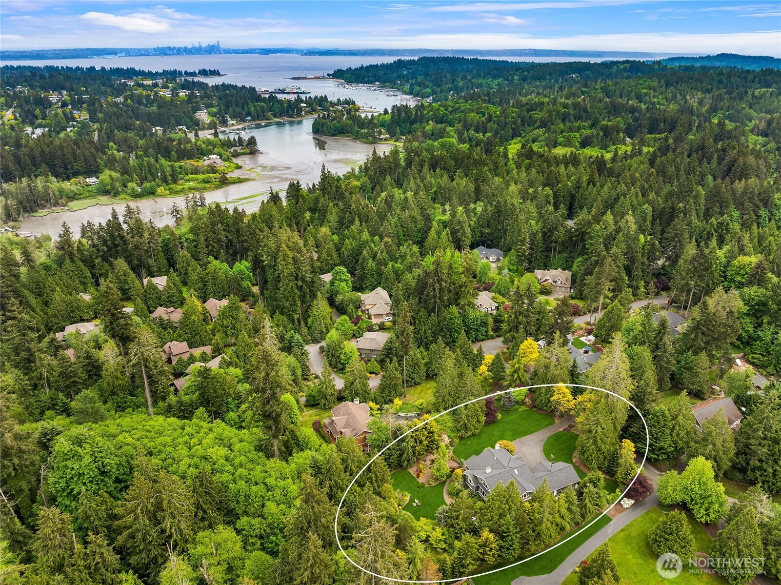 6477 Haley Loop Road Northeast Bainbridge Island, WA 98110 - Photo 40 of 40 a view of a lake from a balcony