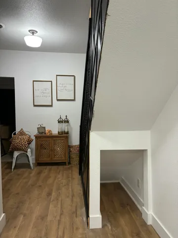 a view of a livingroom with furniture and window