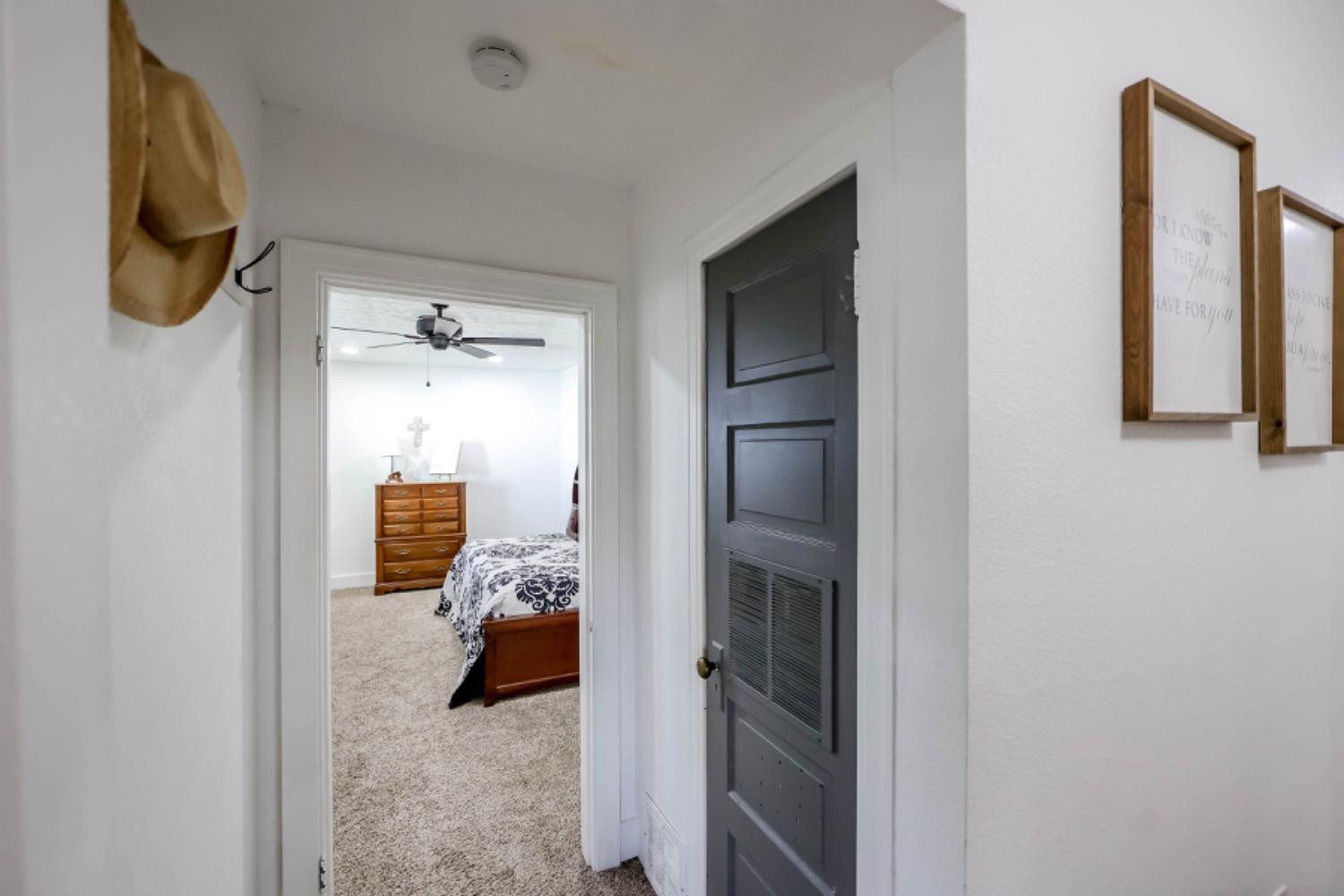 209 D Avenue Abernathy, TX 79311 - Photo 13 of 43 a bedroom with a walk in closet and a window