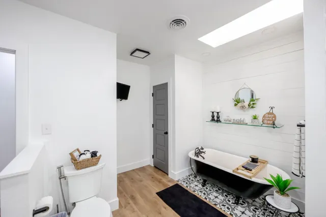 a room with toys and wooden floor