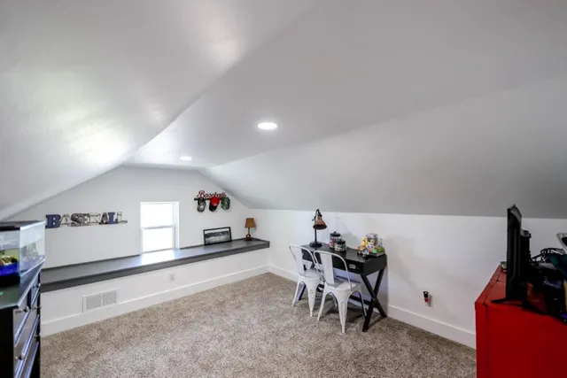 a view of a hallway with staircase