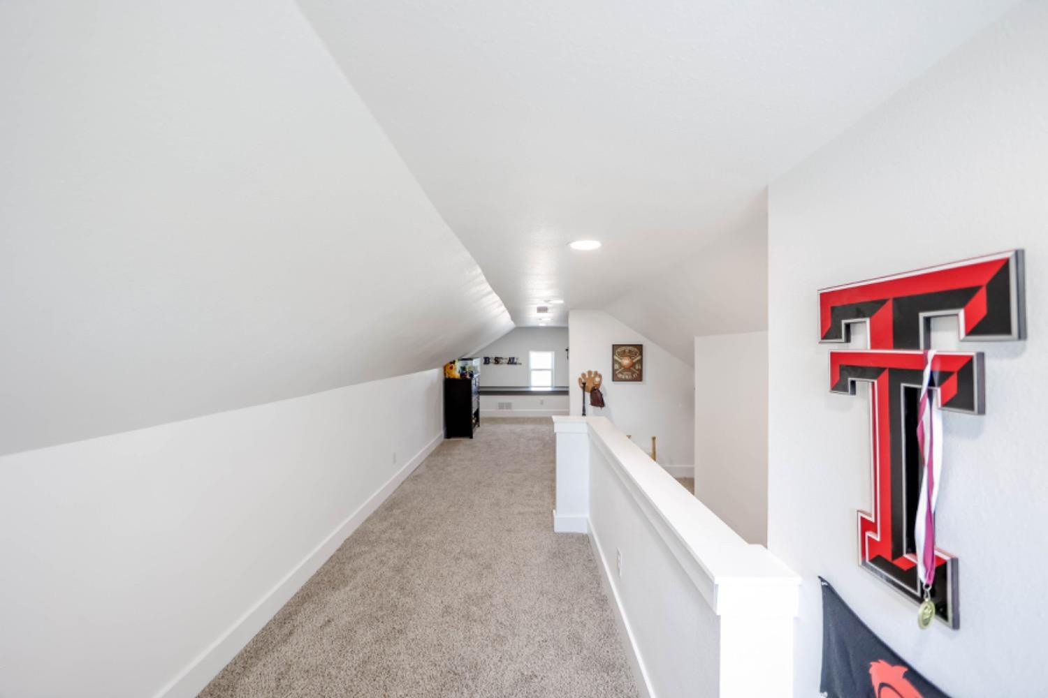 209 D Avenue Abernathy, TX 79311 - Photo 34 of 43 a view of a hallway with staircase