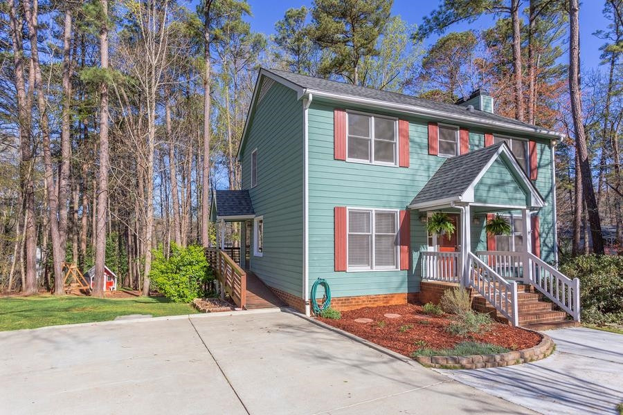 7533 Milestone Court Raleigh, NC 27615 - Photo 3 of 51 Driveway and side kitchen entry
