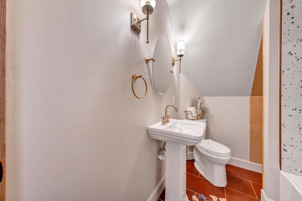 3851 Joppa Mill Road Moneta, VA 24121 - Photo 85 of 104 a bathroom with a sink toilet and a mirror