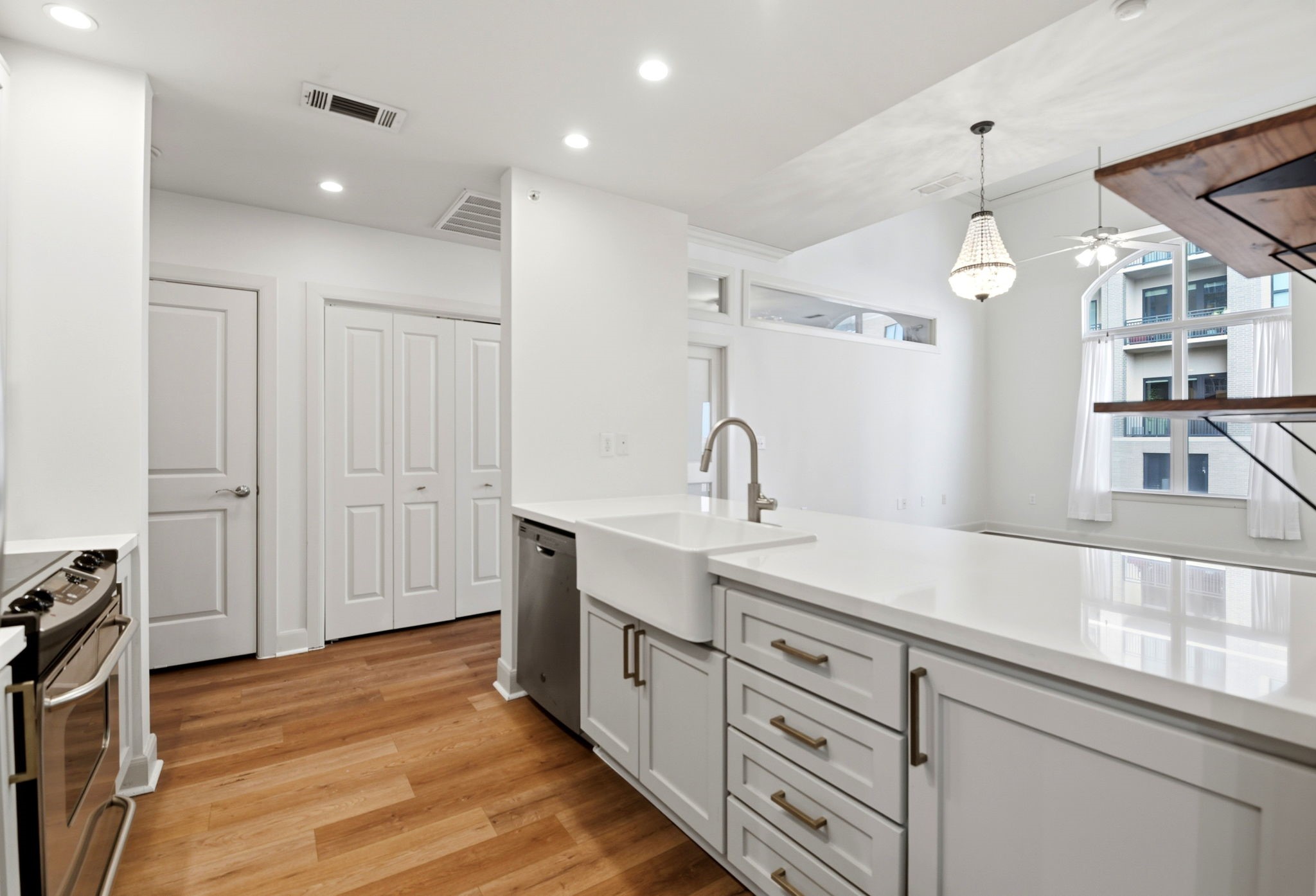 1010 Rosine Street, Unit 43 Houston, TX 77019 - Photo 17 of 48 a kitchen with white cabinets and sink