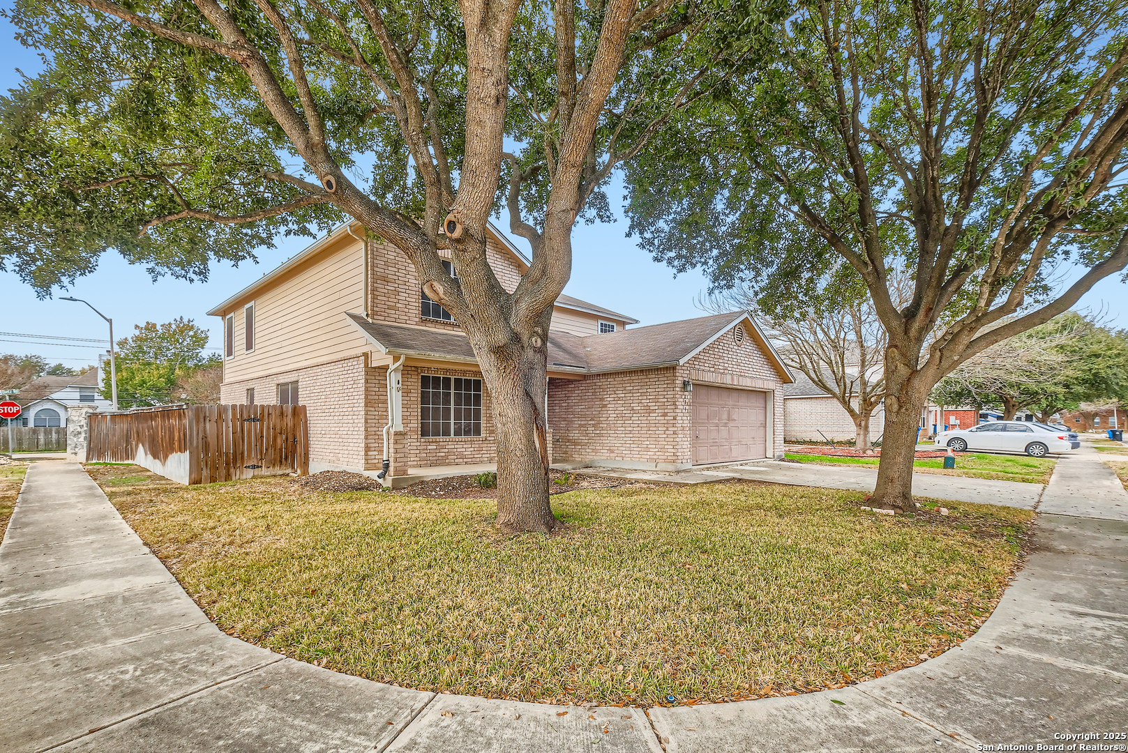431 Woodstone Loop Cibolo, TX 78108 - Photo 2 of 29 a front view of a house with a yard