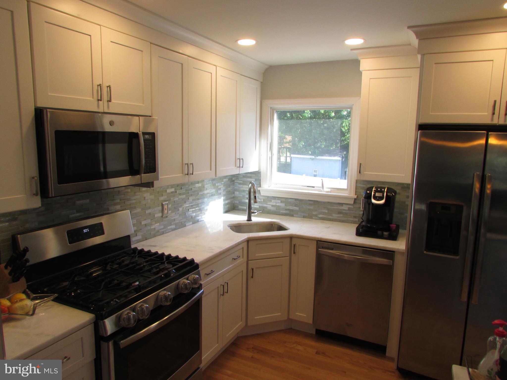 73 Elmont Road Hamilton, NJ 08610 - Photo 4 of 44 Updated kitchen with quartz countertops