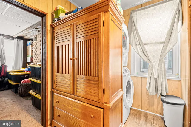 a view of living room and porch with furniture
