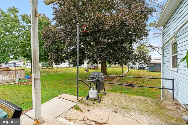a view of a garden with a slide