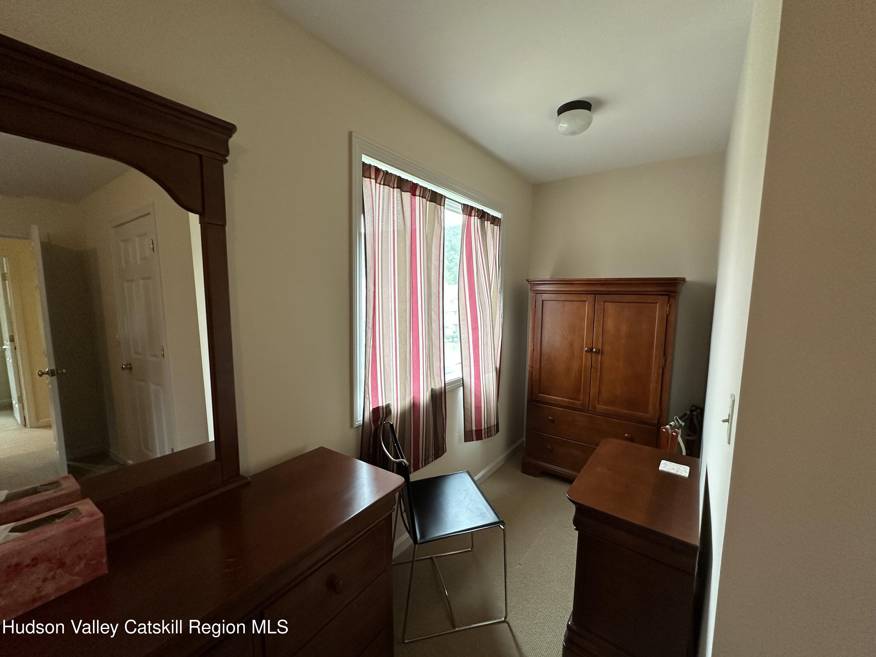 274 Brooksburgh Road, Unit 67 Hensonville, NY 12439 - Photo 31 of 36 a bathroom with a sink and a mirror