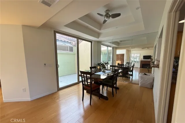a view of a dining room with furniture and a livingroom