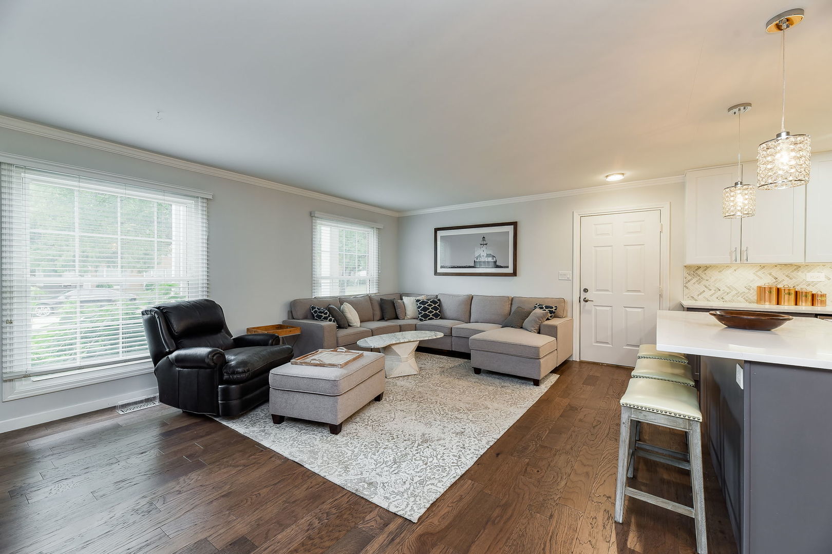 1122 Spring Garden Circle, Unit 2 Naperville, IL 60563 - Photo 2 of 10 a living room with furniture and wooden floor