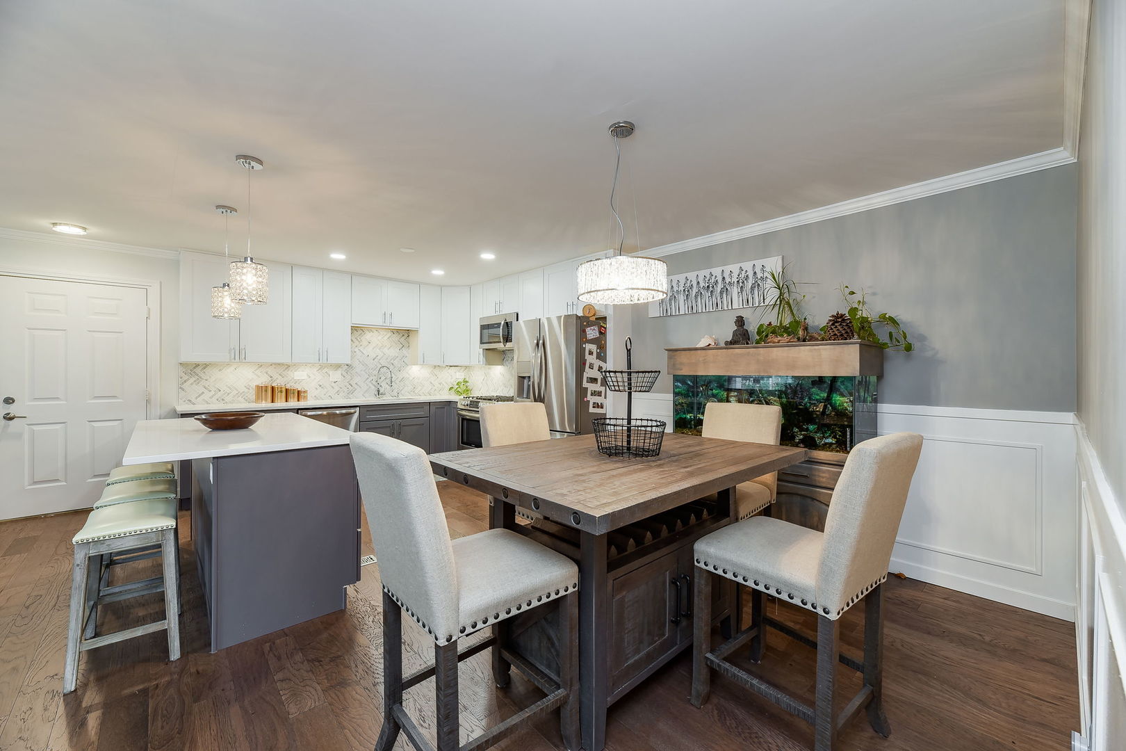 1122 Spring Garden Circle, Unit 2 Naperville, IL 60563 - Photo 5 of 10 a view of kitchen with cabinets and wooden floor