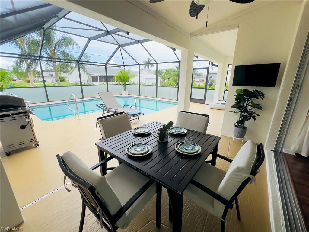8312 Tahiti Road Fort Myers, FL 33967 - Photo 24 of 43 Enjoy watching Sports Events, Movies Pool Side