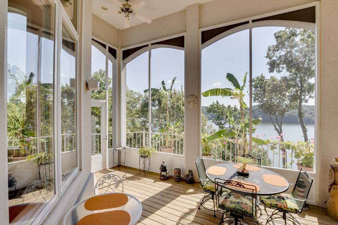328 River Trace Road Dover, TN 37058 - Photo 25 of 30 a living room filled with furniture and a table