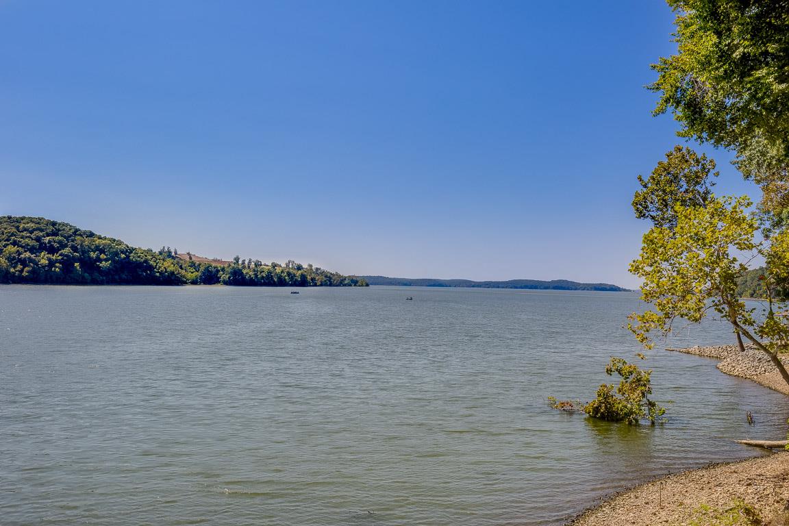 328 River Trace Road Dover, TN 37058 - Photo 28 of 30 a view of an ocean with boats and trees in the background