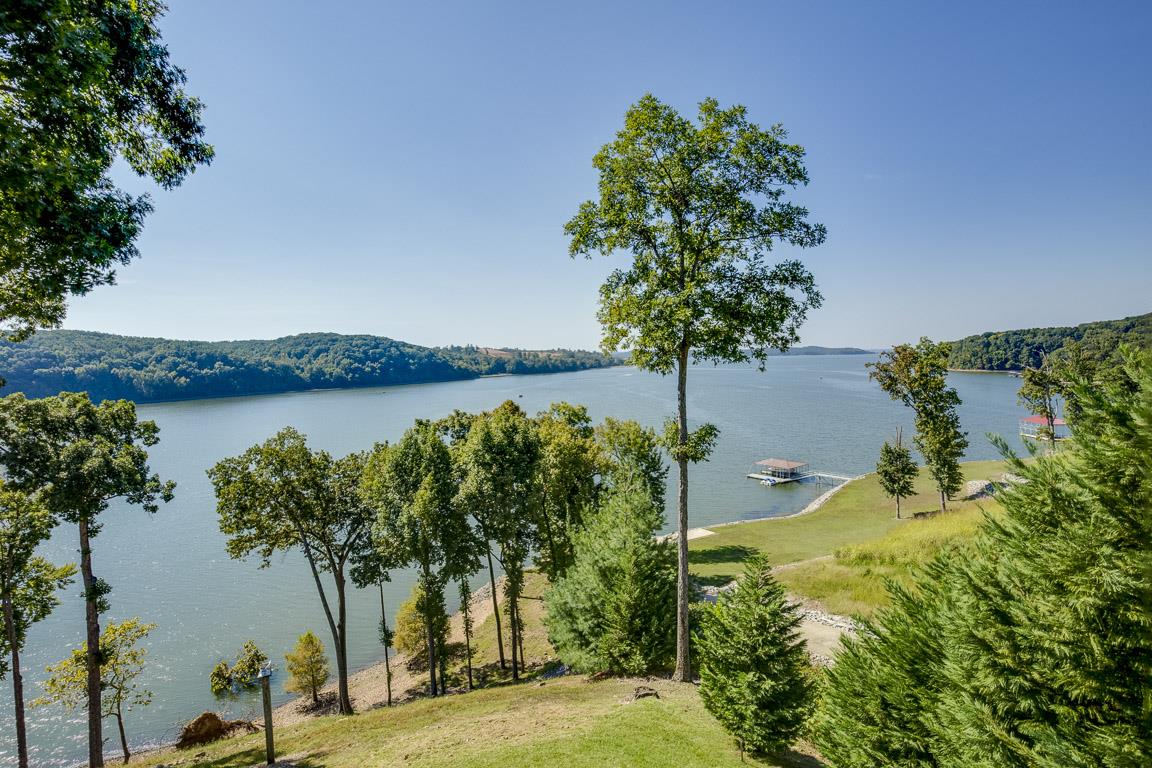 328 River Trace Road Dover, TN 37058 - Photo 29 of 30 a view of a lake with a big yard