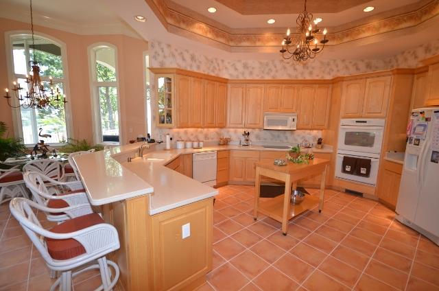 328 River Trace Road Dover, TN 37058 - Photo 8 of 30 a large white kitchen with a large window