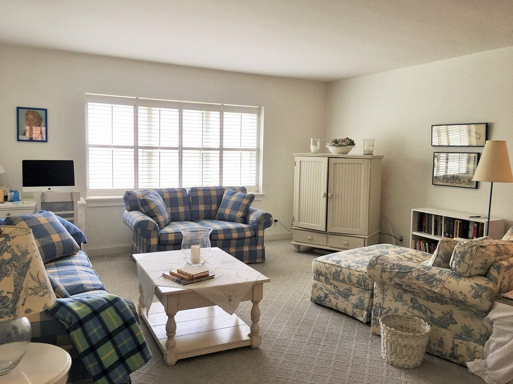 198 Lake Shore Road, Unit 2 Boston, MA 02135 - Photo 4 of 17 a living room with furniture and a window