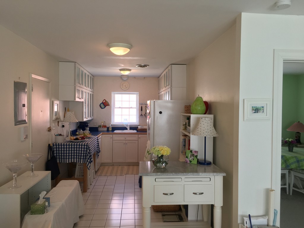 198 Lake Shore Road, Unit 2 Boston, MA 02135 - Photo 6 of 17 a living room with furniture and wooden floor