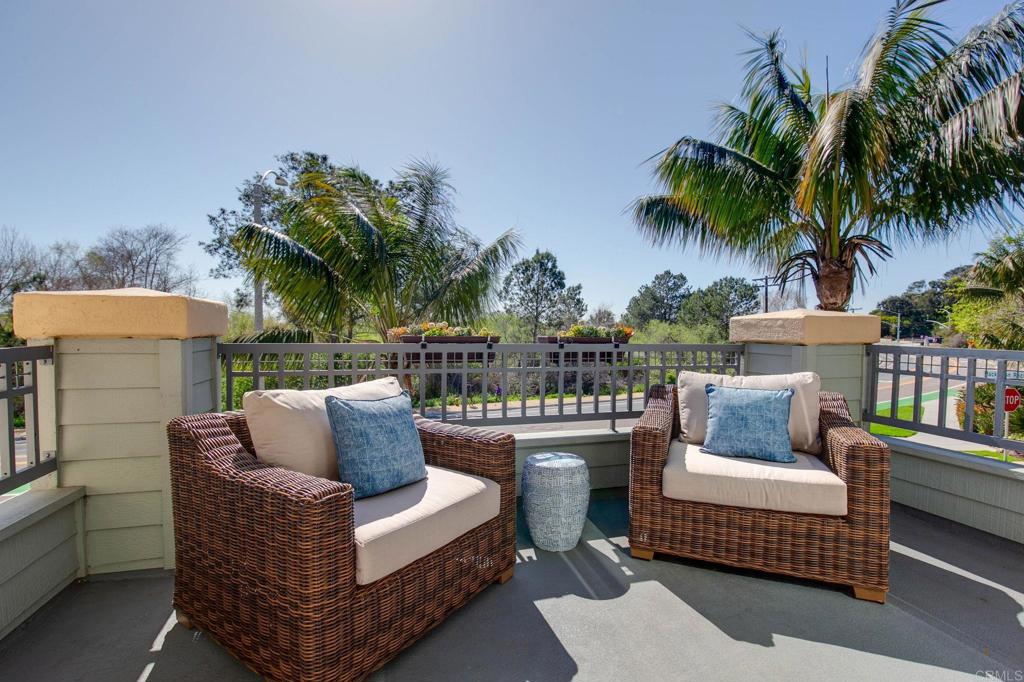2738 MacKinnon Ranch Road Cardiff-by-the-Sea, CA 92007 - Photo 12 of 58 a outdoor living room with furniture and a potted plant