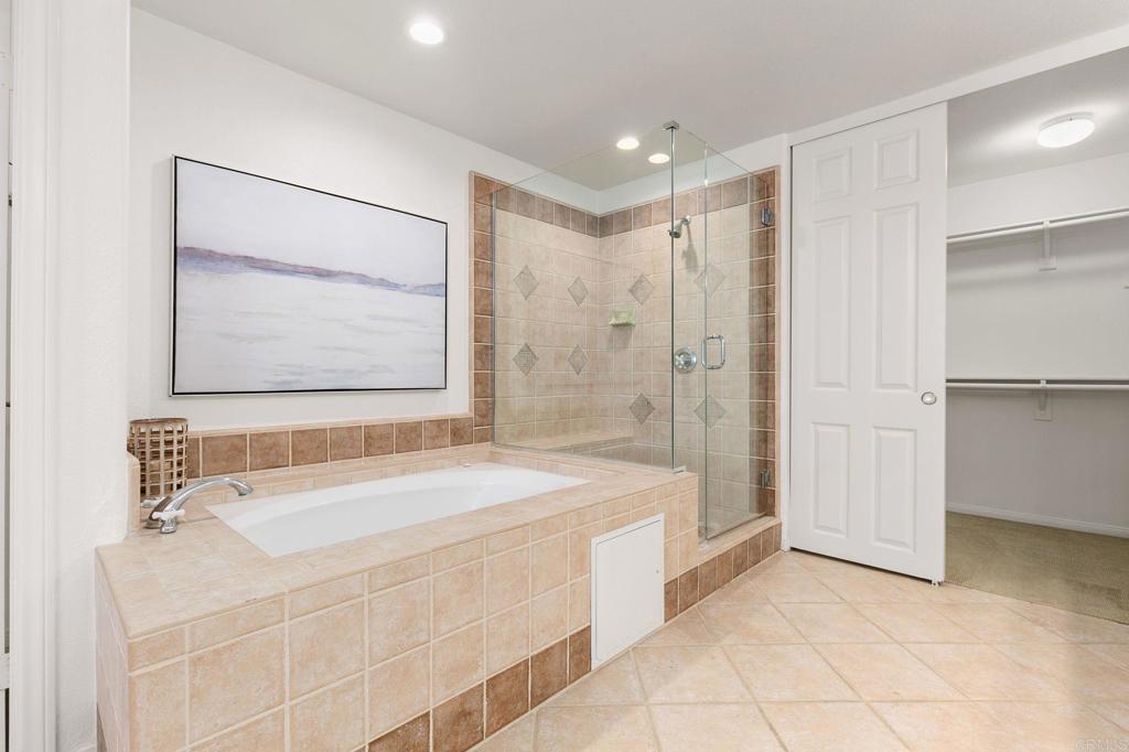 2738 MacKinnon Ranch Road Cardiff-by-the-Sea, CA 92007 - Photo 29 of 58 a bathroom with a bathtub and a sink