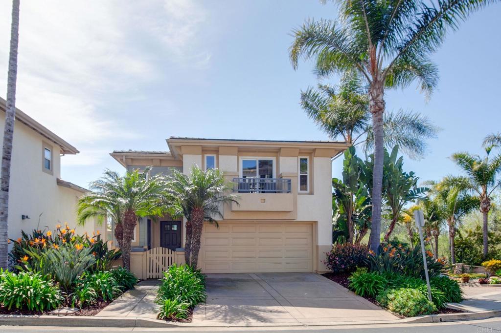 2738 MacKinnon Ranch Road Cardiff-by-the-Sea, CA 92007 - Photo 3 of 58 a front view of house and yard with green space