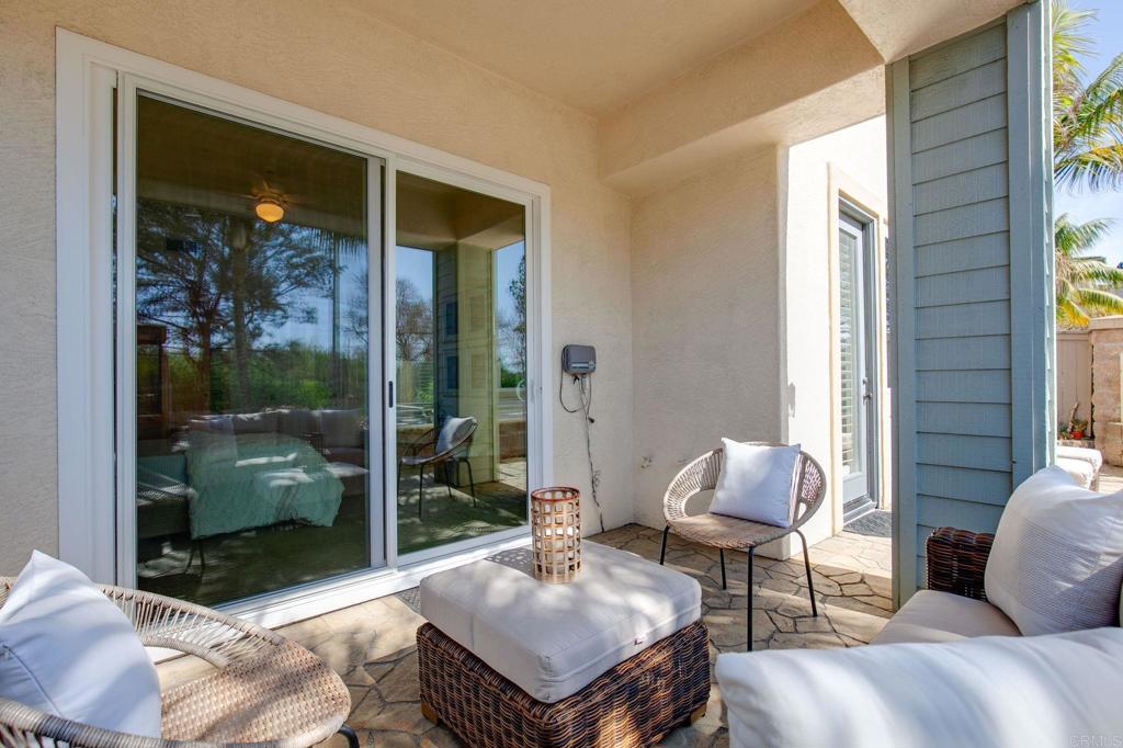 2738 MacKinnon Ranch Road Cardiff-by-the-Sea, CA 92007 - Photo 37 of 58 a living room with furniture and a window