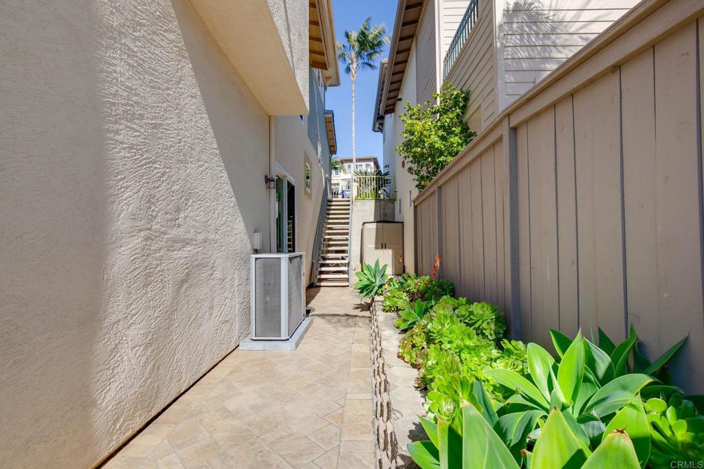2738 MacKinnon Ranch Road Cardiff-by-the-Sea, CA 92007 - Photo 42 of 58 a backyard with potted plants