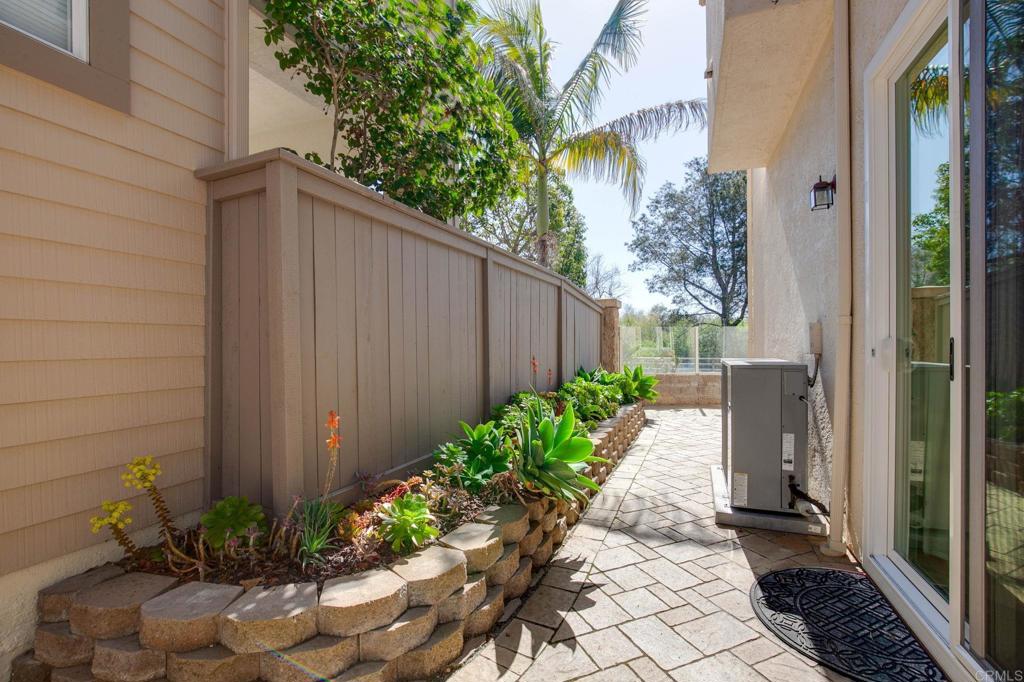 2738 MacKinnon Ranch Road Cardiff-by-the-Sea, CA 92007 - Photo 43 of 58 a view of a pathway with a potted plants