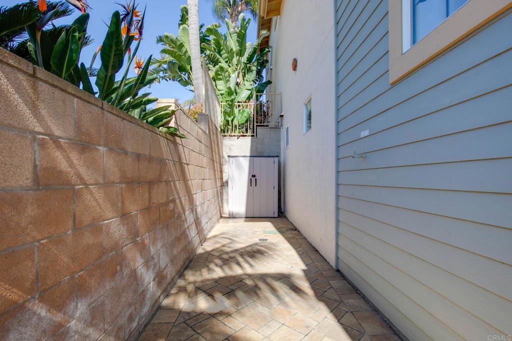 2738 MacKinnon Ranch Road Cardiff-by-the-Sea, CA 92007 - Photo 44 of 58 a view of a pathway besides a house