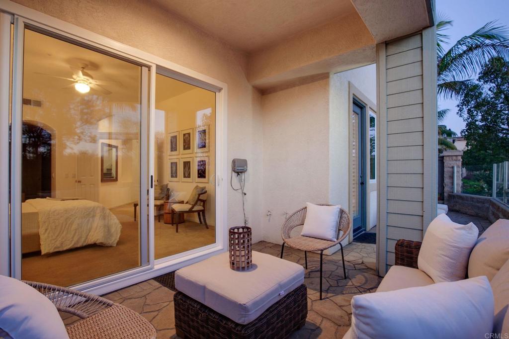 2738 MacKinnon Ranch Road Cardiff-by-the-Sea, CA 92007 - Photo 50 of 58 a living room with furniture and a large window