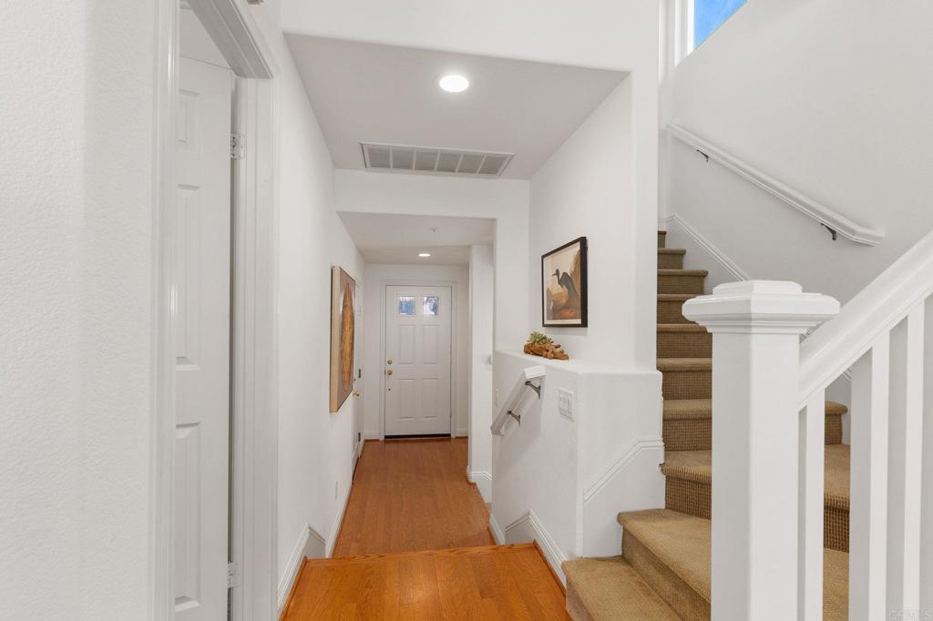 2738 MacKinnon Ranch Road Cardiff-by-the-Sea, CA 92007 - Photo 5 of 58 a view of a hallway with front door