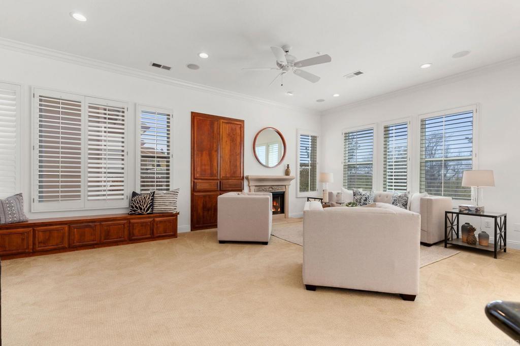 2738 MacKinnon Ranch Road Cardiff-by-the-Sea, CA 92007 - Photo 7 of 58 a living room with furniture and a large window