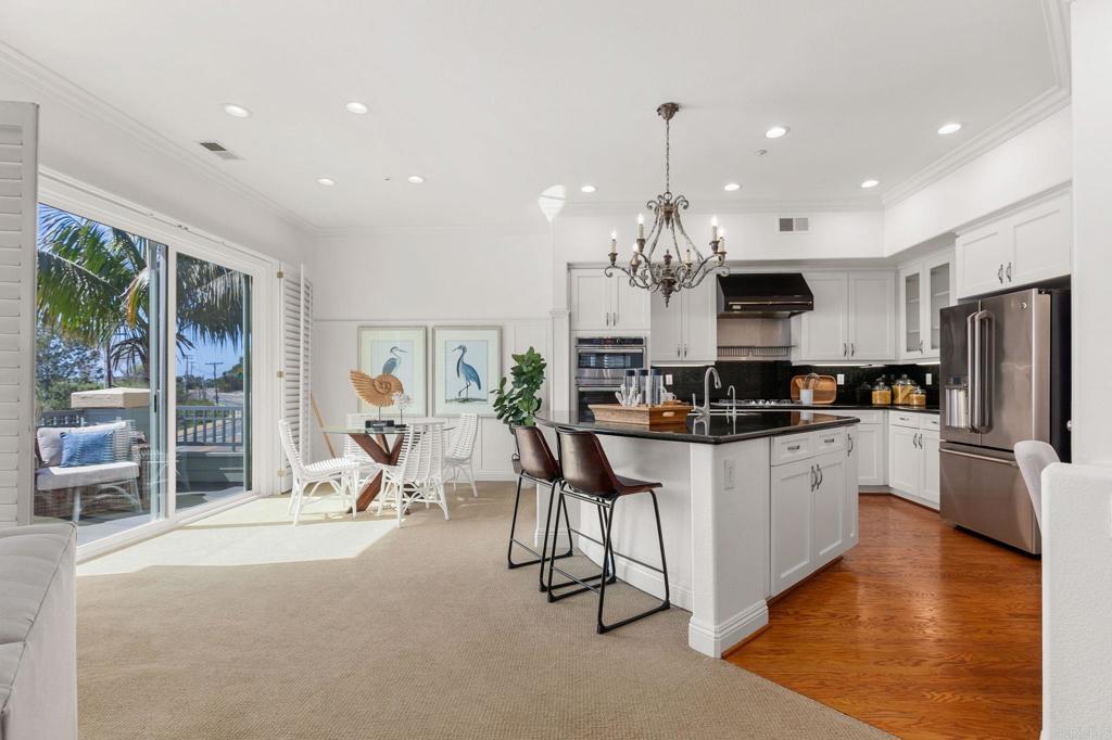 2738 MacKinnon Ranch Road Cardiff-by-the-Sea, CA 92007 - Photo 10 of 58 a kitchen with counter space cabinets and appliances