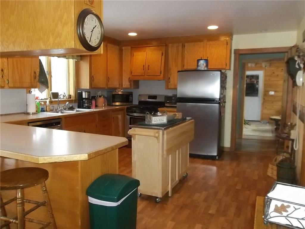 25 Linscott Road Jefferson, ME 04348 - Photo 2 of 29 Kitchen w/bar. Stainless steel...