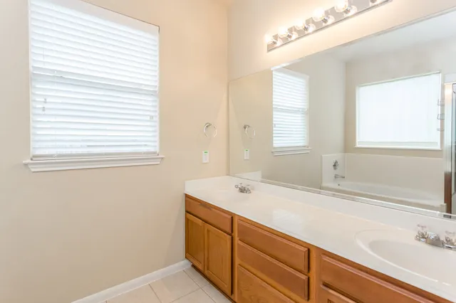 a bathroom with a sink and a bathtub