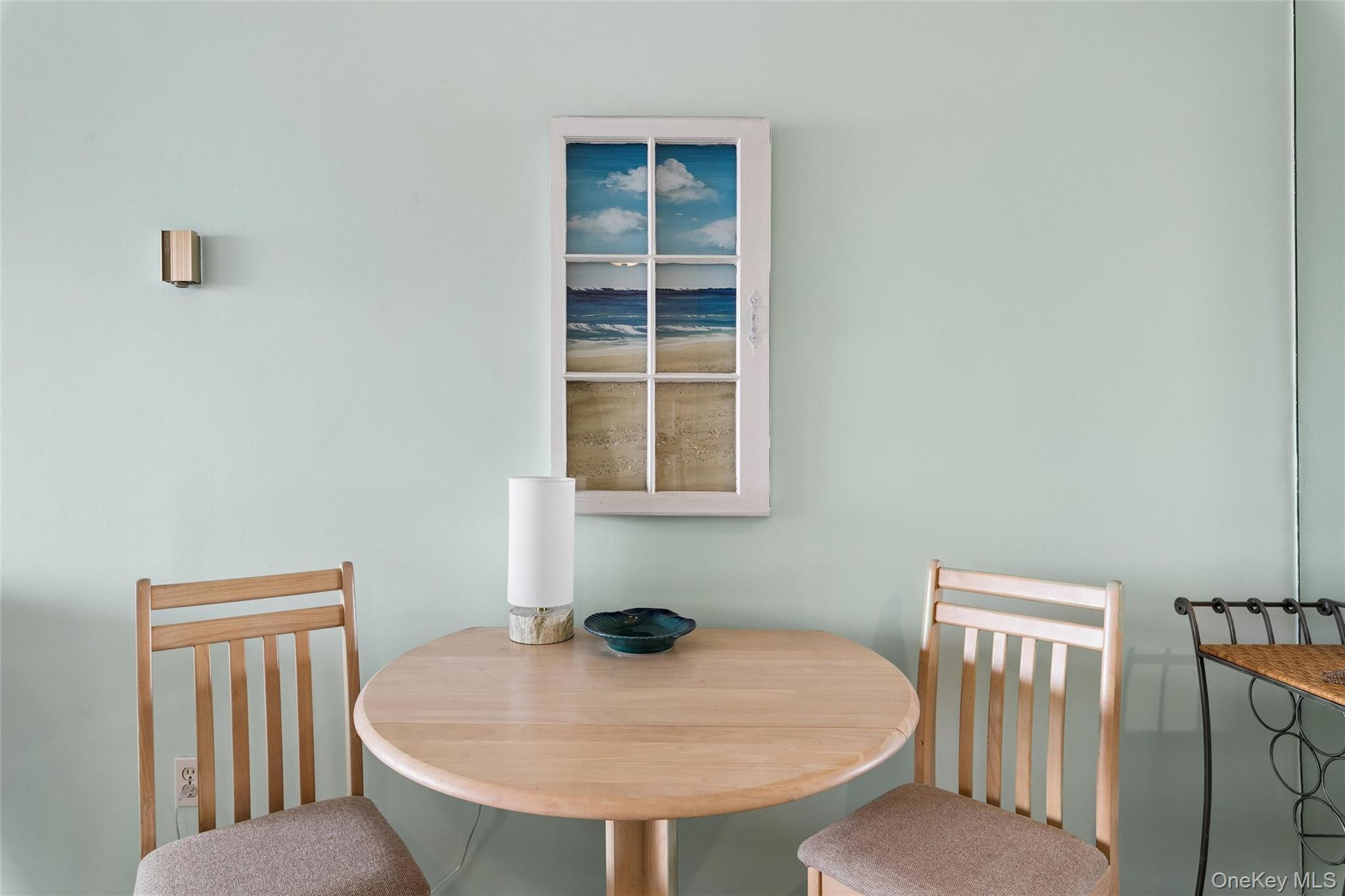 274 Dune Road, Unit 9 Westhampton Beach, NY 11978 - Photo 5 of 13 a workspace with furniture and window