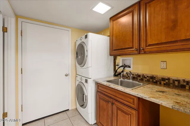 a view of an outdoor sitting area with furniture and a backyard