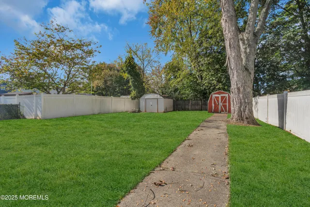 a view of a house with a back yard