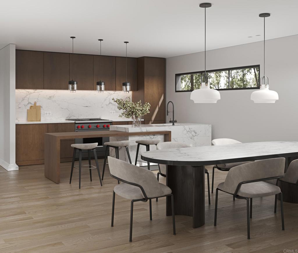 3405 Pacific View Way Oceanside, CA 92056 - Photo 2 of 11 a kitchen with a table and chairs in it