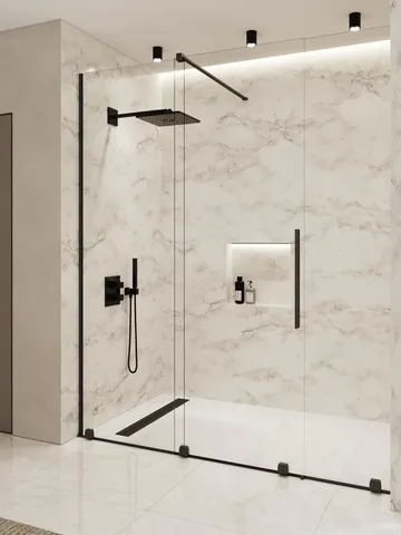 a bathroom with a glass shower door