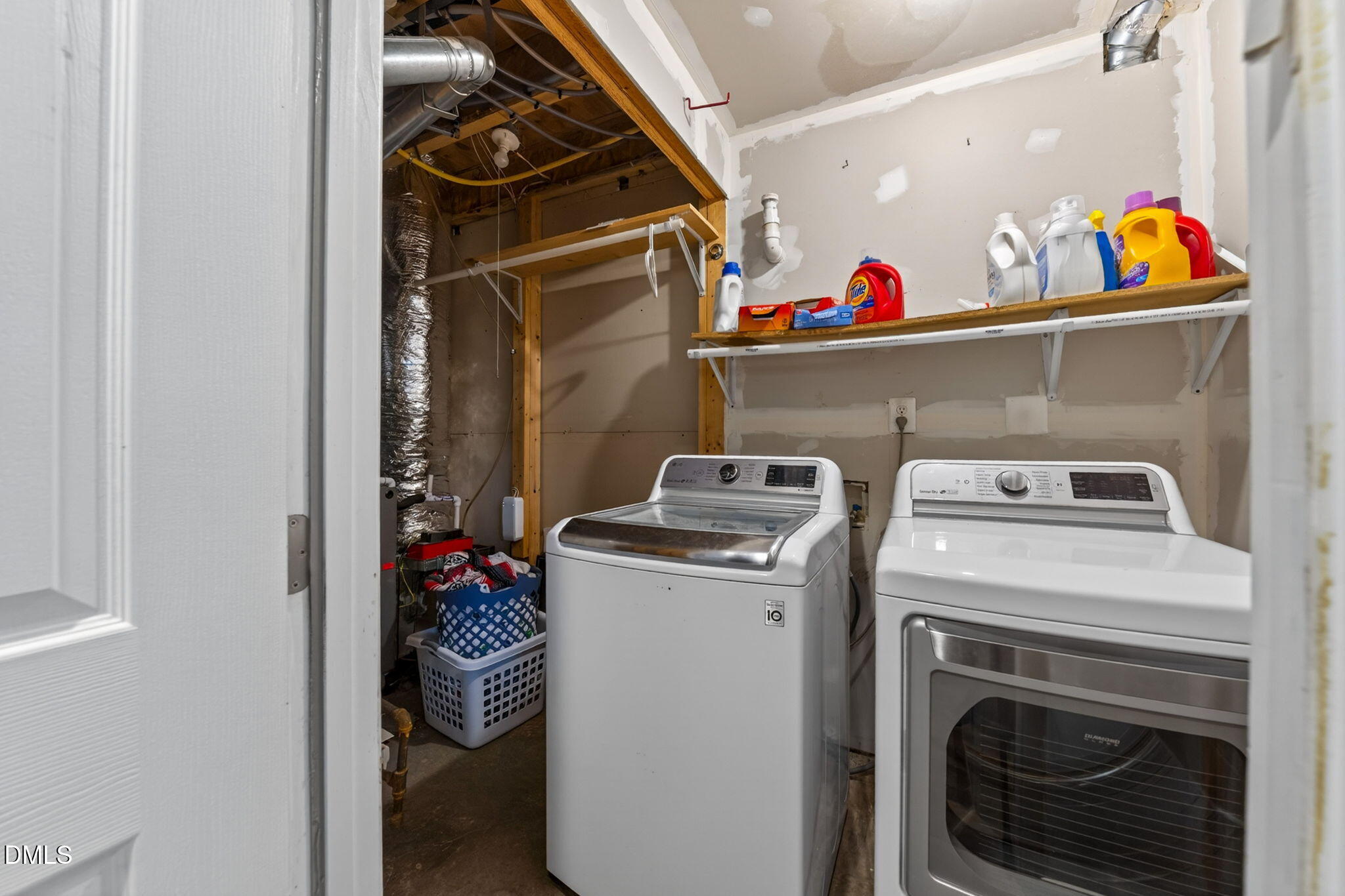 5500 Vista View Court Raleigh, NC 27612 - Photo 34 of 38 a utility room with dryer and washer