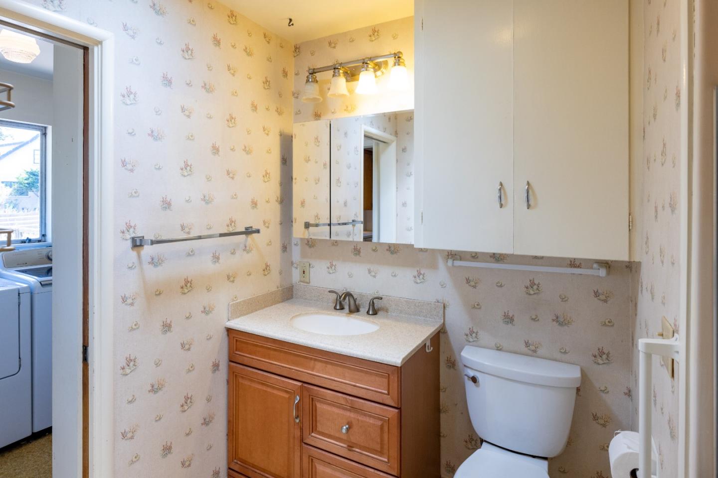 30 Acropolis Street Pacific Grove, CA 93950 - Photo 17 of 36 a bathroom with a sink toilet and shower