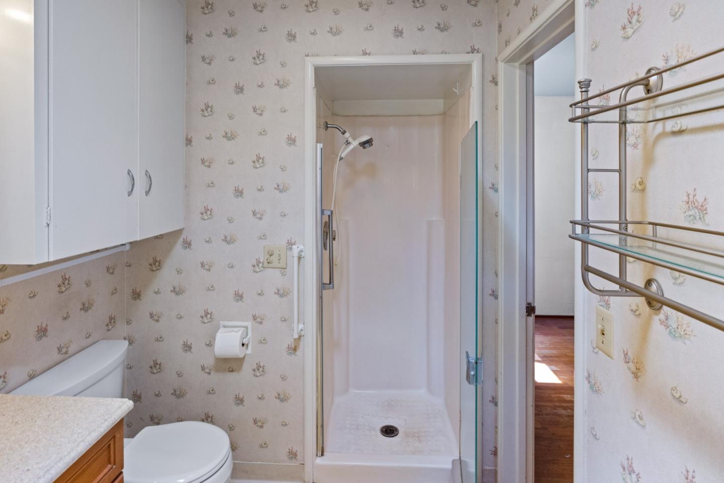 30 Acropolis Street Pacific Grove, CA 93950 - Photo 18 of 36 a bathroom with a shower toilet and sink