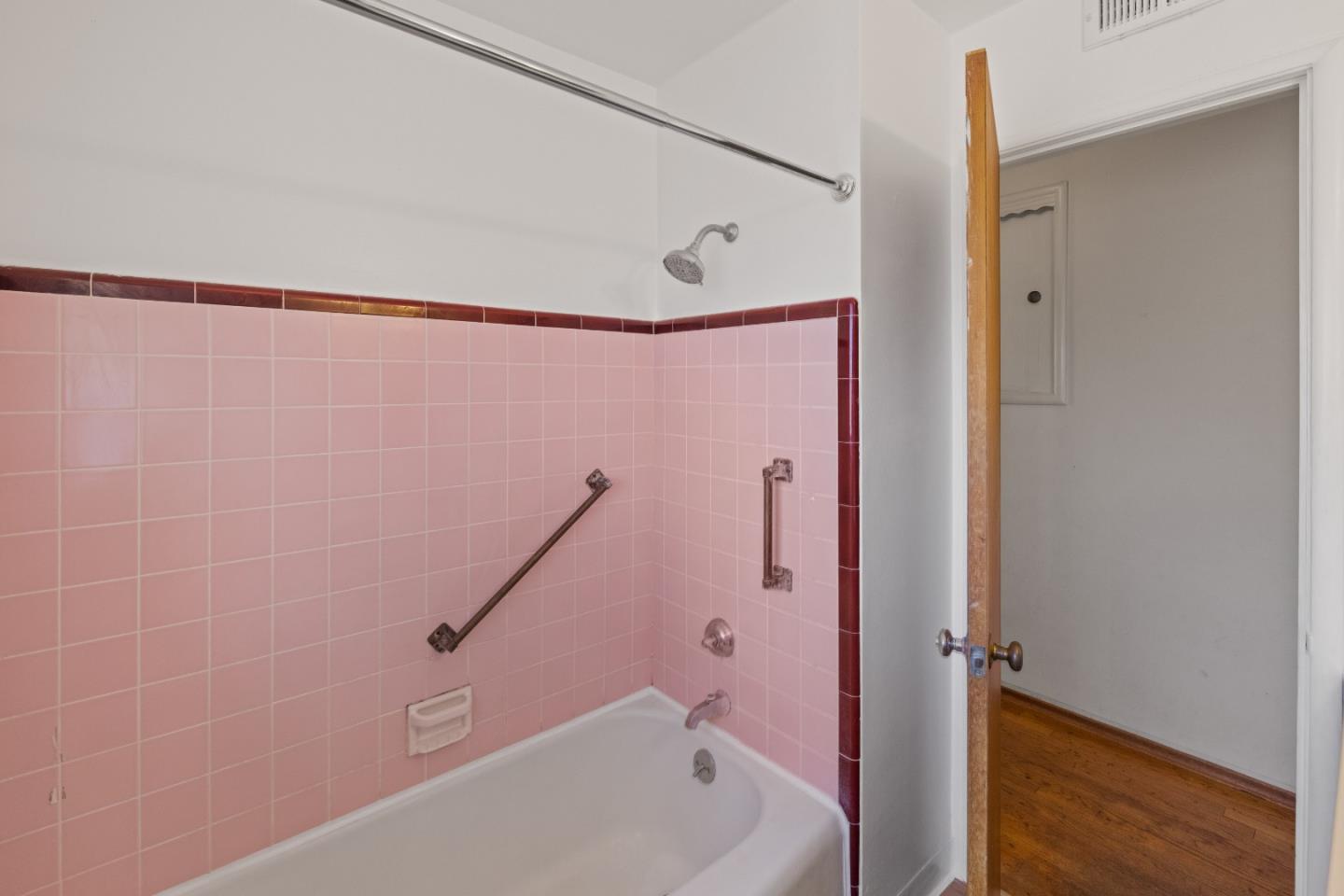30 Acropolis Street Pacific Grove, CA 93950 - Photo 22 of 36 a bathroom with a bathtub and a shower