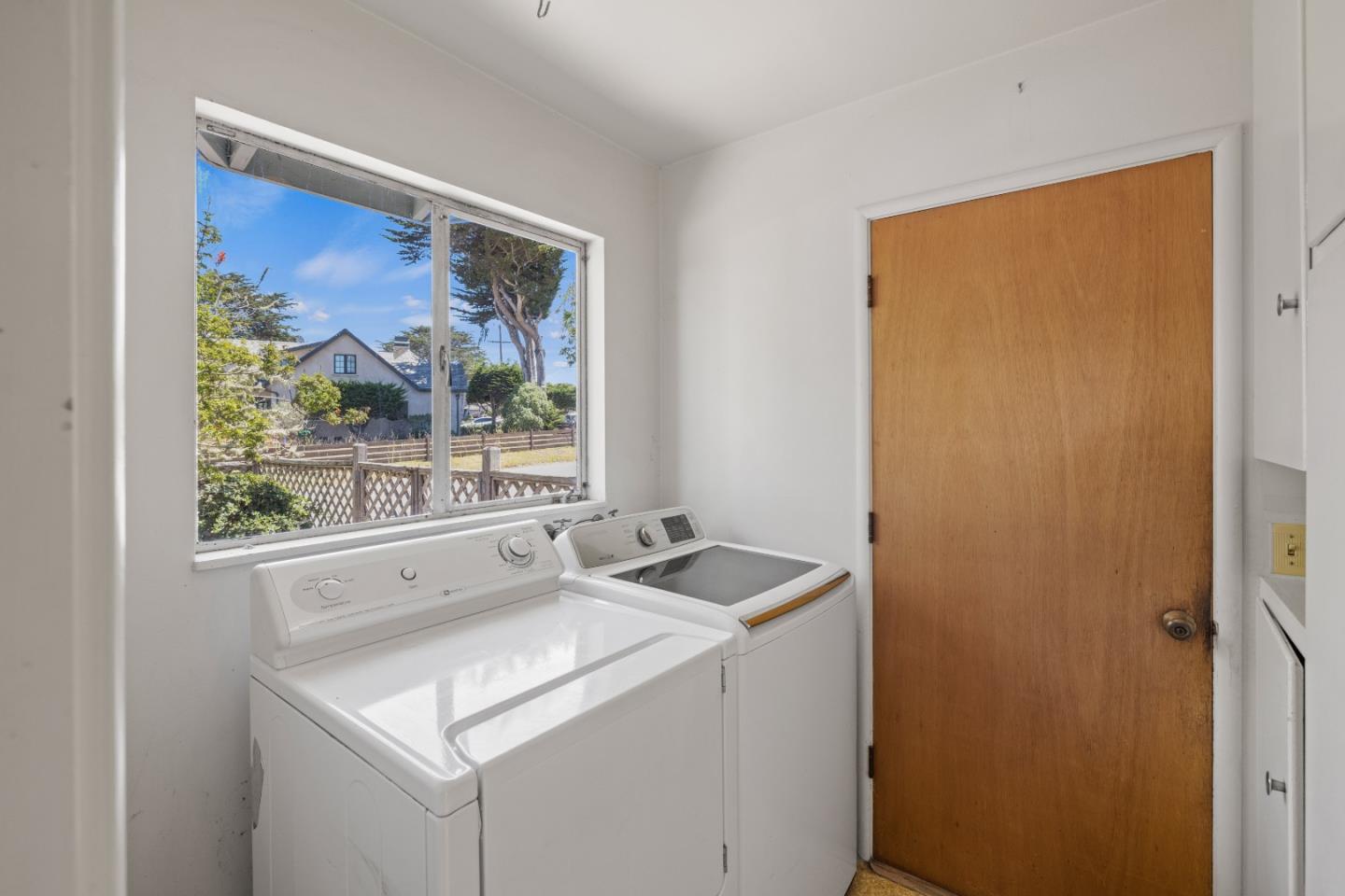 30 Acropolis Street Pacific Grove, CA 93950 - Photo 26 of 36 a bathroom with a sink and a window
