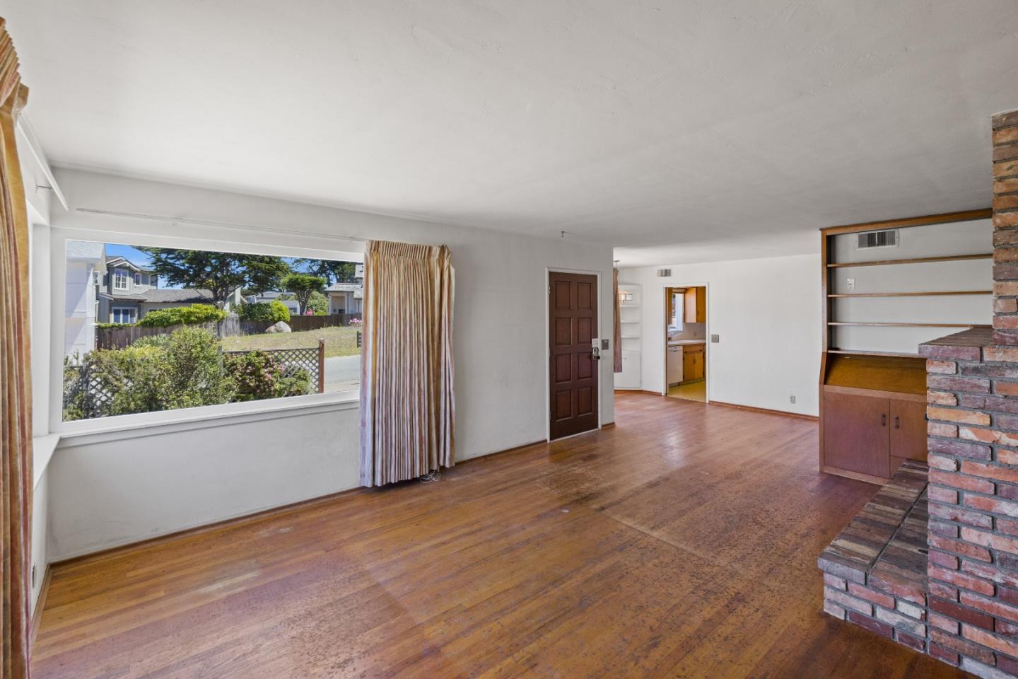 30 Acropolis Street Pacific Grove, CA 93950 - Photo 5 of 36 an empty room with windows and an empty room